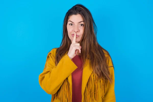 Young Beautiful Woman Wearing Jacket Blue Studio Background Makes Hush — Stock Photo, Image