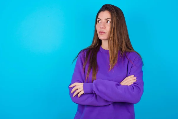 Charming Thoughtful Beautiful Woman Wearing Purple Sweater Blue Studio Background — Stock Photo, Image