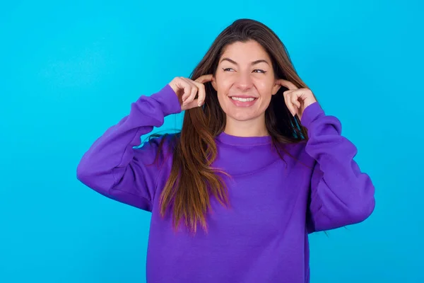 Happy Beautiful Woman Wearing Purple Sweater Blue Studio Background Ignores — Stock Photo, Image