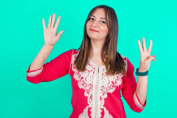 Young Beautiful Caucasian Woman Showing Fingers Number Eight While Smiling — Stock Photo, Image