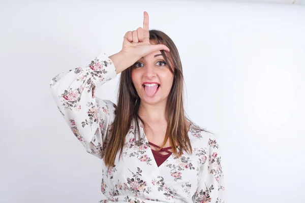 Woman Wearing Floral Dress White Background Gestures Finger Forehead Makes — Stock Photo, Image