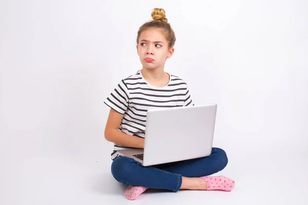 Dissatisfied Beautiful Caucasian Teen Girl Sitting Laptop Lotus Position White — Stock Photo, Image