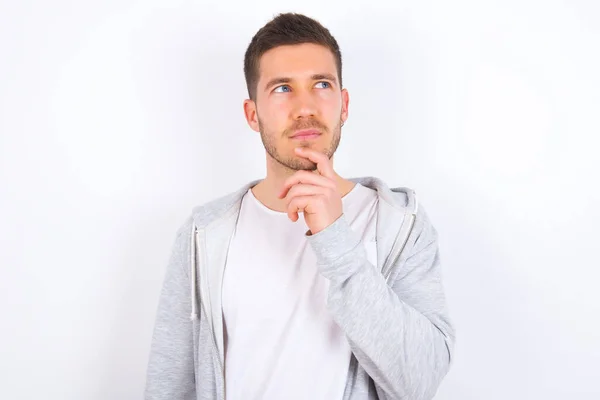 Shot Contemplative Thoughtful Young Caucasian Man Wearing Casual Clothes White — Stock Photo, Image