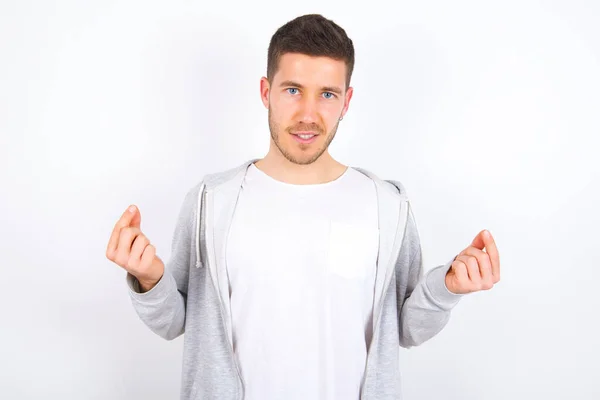 Young Caucasian Man Wearing Casual Clothes White Background Making Money — Stock Photo, Image