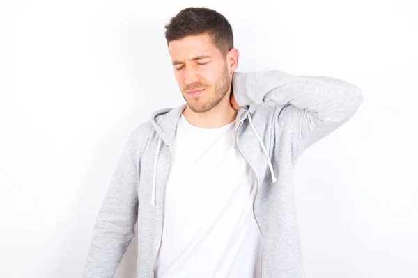Young Caucasian Man Wearing Casual Clothes White Background Suffering Back — Stock Photo, Image