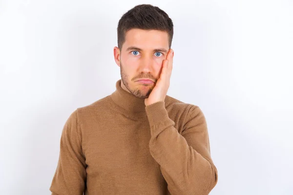 Sad Lonely Young Caucasian Man Touches Cheek Hand Bites Lower — Stock Photo, Image