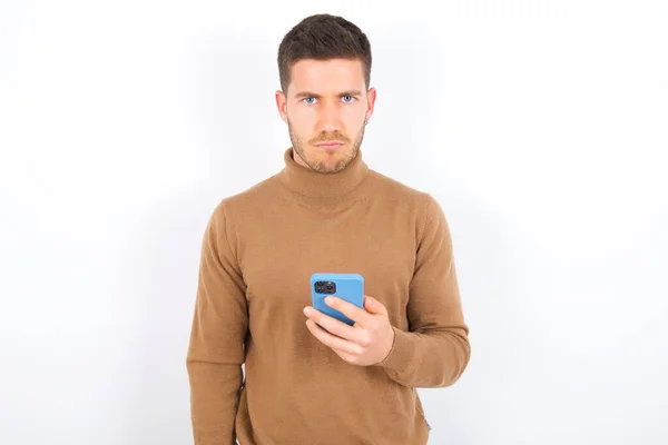 Upset Dissatisfied Young Caucasian Man Wearing Turtleneck White Background Uses — Stock Photo, Image