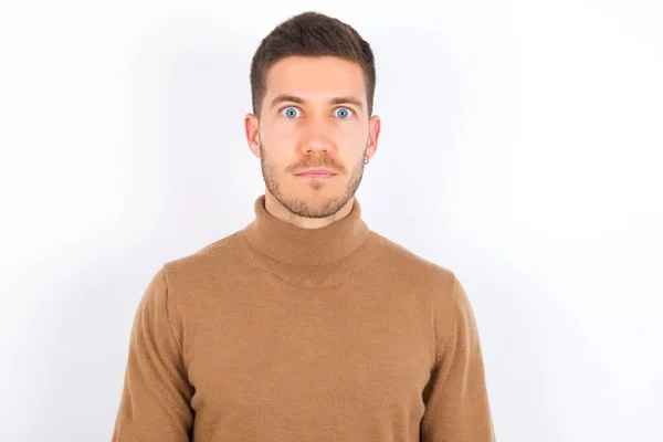 Stunned Young Caucasian Man Wearing Turtleneck White Background Stares Reacts — Stock Photo, Image