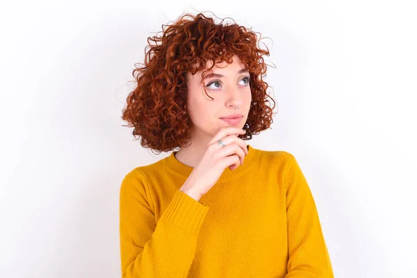 Shot Contemplative Thoughtful Young Redhead Girl Wearing Yellow Sweater White — Stock Photo, Image