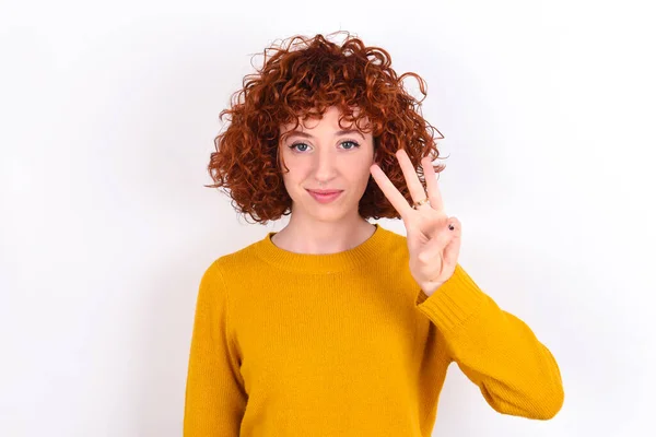 Young Redhead Girl Wearing Yellow Sweater White Background Showing Pointing — Stock Photo, Image