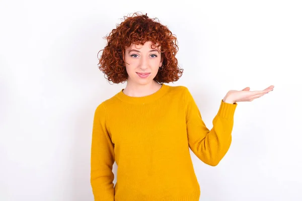 Positive Glad Young Redhead Girl Wearing Yellow Sweater White Background — Stock Photo, Image
