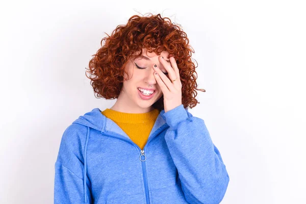 Young Redhead Girl Wearing Blue Jacket White Background Makes Face — Stock Photo, Image