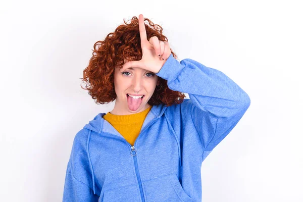 Young Redhead Girl Wearing Blue Jacket White Background Gestures Finger — Stock Photo, Image