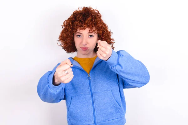 Displeased Annoyed Young Redhead Girl Wearing Blue Jacket White Background — стоковое фото