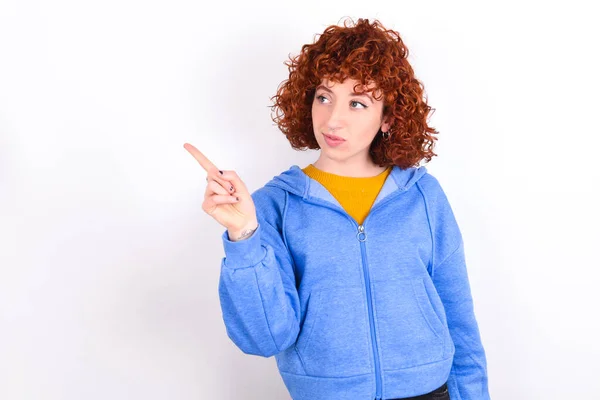 Young Redhead Girl Wearing Blue Jacket White Background Points Copy — Stock Photo, Image