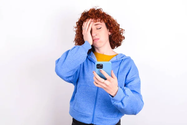 Upset Depressed Young Redhead Girl Wearing Blue Jacket White Background — Stock Photo, Image