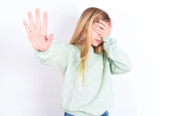 Little Caucasian Kid Girl Covers Eyes Palm Doing Stop Gesture — Stock Photo, Image