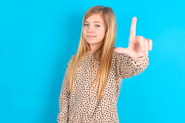 Caucasian Kid Girl Making Fun People Fingers Forehead Doing Loser — Stock Photo, Image