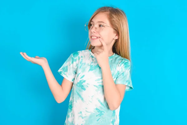 Positive Little Caucasian Kid Girl Wearing Trendy Shirt Blue Background — Stock Photo, Image