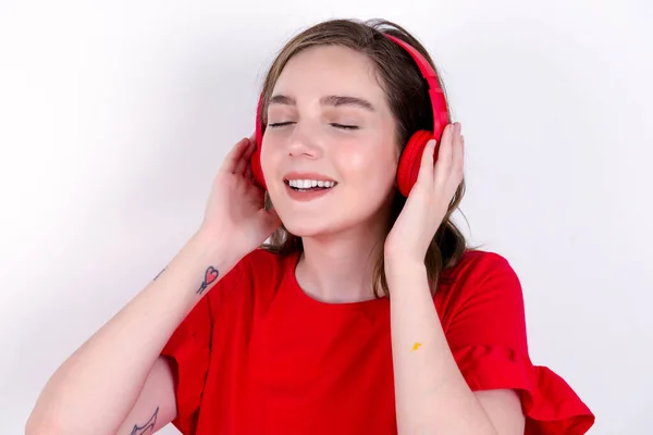 Girl Smiles Broadly Listening Favourite Music Track Wireless Headphones Closed — Stock Photo, Image