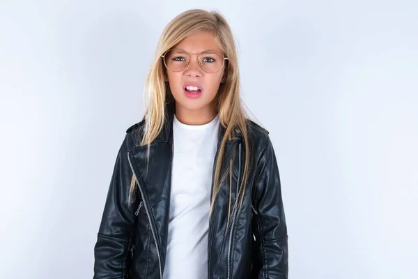 Portrait Dissatisfied Beautiful Blonde Little Girl Wearing Biker Jacket Glasses — Stock Photo, Image
