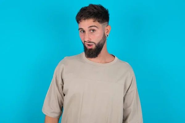 Portrait Dissatisfied Bearded Caucasian Man Wearing Casual Shirt Blue Background — Stock Photo, Image