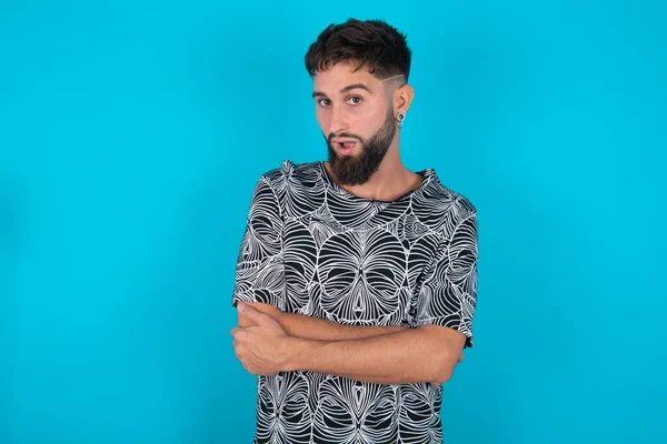 Shocked Embarrassed Young Hispanic Bearded Man Standing Blue Background Keeps — Stock Photo, Image