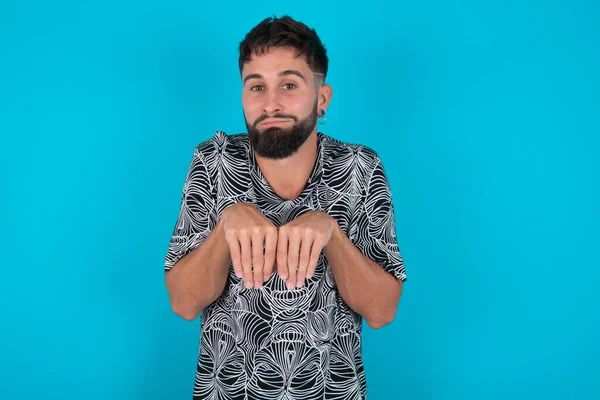 Young Hispanic Bearded Man Standing Blue Background Makes Bunny Paws — Stock Photo, Image