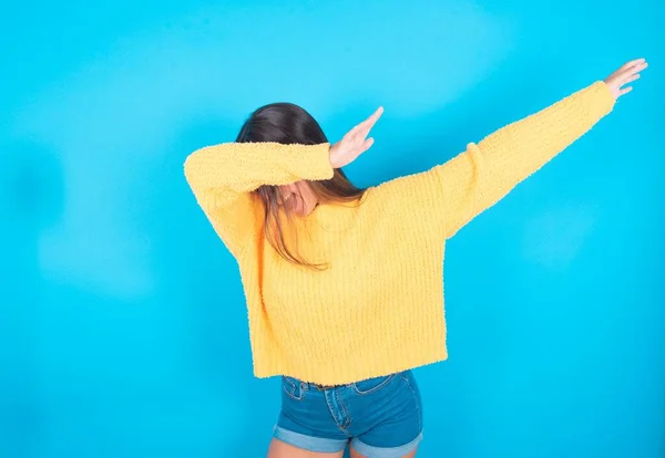 Photo Funky Young Brunette Woman Wearing Yellow Sweater Blue Background — Stock Photo, Image