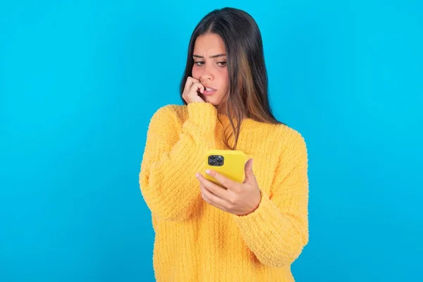 Portrait Pretty Frightened Brunette Woman Wearing Yellow Sweater Chatting Biting — Stock Photo, Image