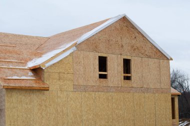 roof and walls of a new plywood house home frame trussproperty