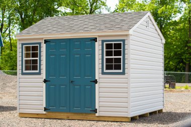 storage shed wooden door window yard spring