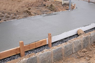 freshly flooded pavement for pedestrians new material floor