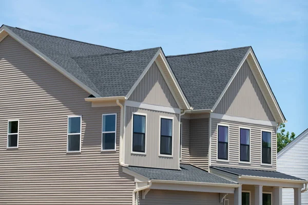 facade of a new plywood house residential window modern and shingle roof wall real work room