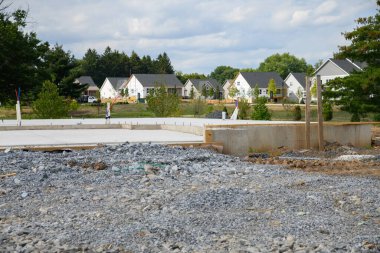Foundations of the house, unfinished bungalow, rough construction new material ground