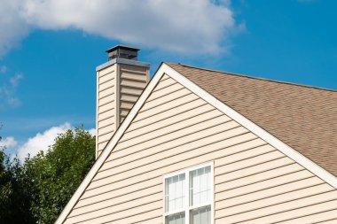 chimney from the fireplace outside house roof day sky heat