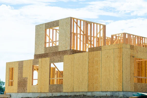 plywood walls of a new house framework timber building lumber board property window