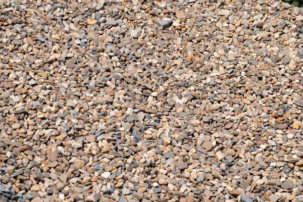 Grote Stapel Van Aangespoelde Kleine Stenen Close Natuurlijke Minerale Stapel — Stockfoto