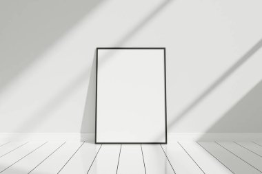 Minimalist ve temiz dikey siyah poster ya da yere yaslanmış gölgeli fotoğraf çerçevesi.