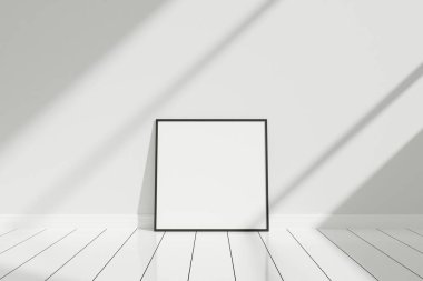 Minimalist ve temiz kare siyah poster ya da yere yaslanmış gölgeli fotoğraf çerçevesi.