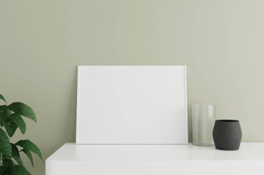 Minimalist and clean horizontal white poster or photo frame mockup on the white table leaning against the room wall with vase and plant. 3D Rendering.