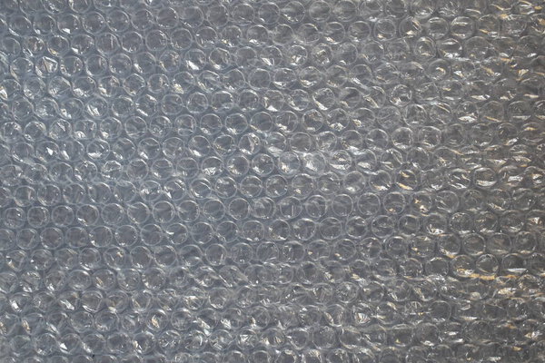 Прозрачный пластиковый пузырь воздуха упаковки текстурированный фон