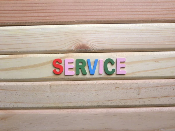 Word Service on wood background