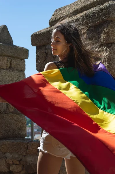 Portrait Attractive Woman Holding Rainbow Flag Her Shoulders Looking Side — Photo