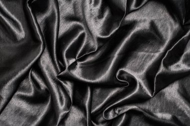 Soyut arka plan lüks kumaş veya sıvı dalga veya grunge ipek kumaş kıvrımlı saten kadife kumaş veya karanlıkta lüks.