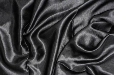 Soyut arka plan lüks kumaş veya sıvı dalga veya grunge ipek kumaş kıvrımlı saten kadife kumaş veya karanlıkta lüks.