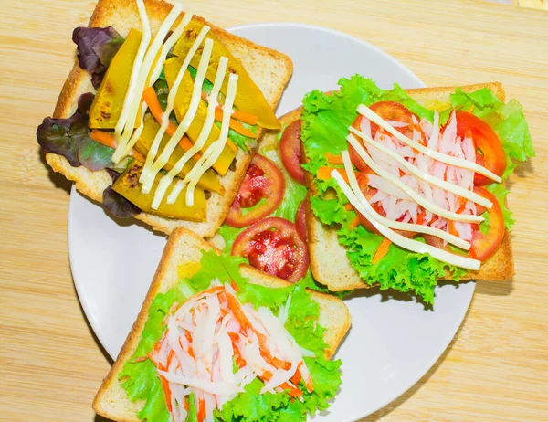 Sandwich Cheese Cucumber Tomato Lettuce Tomato Crab Pumpkin Plate Wood — Foto de Stock