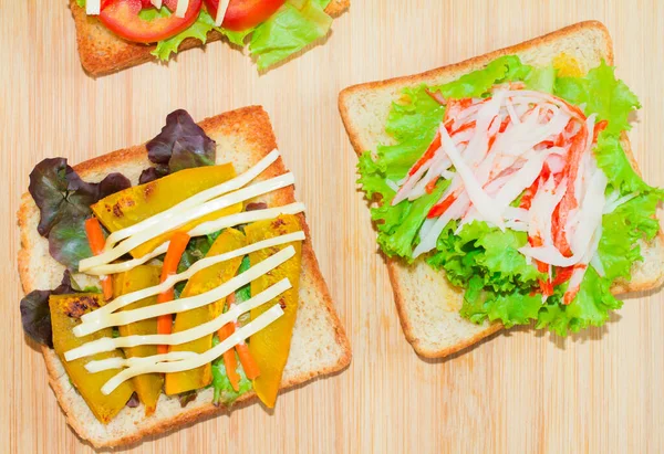 Sandwich Cheese Cucumber Tomato Lettuce Tomato Crab Pumpkin Wood Top — Foto de Stock