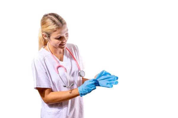 Young Medical Girl Putting Blue Gloves — Stockfoto