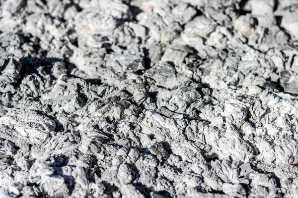 Carbon texture. Carbon consumed and converted into ashes.